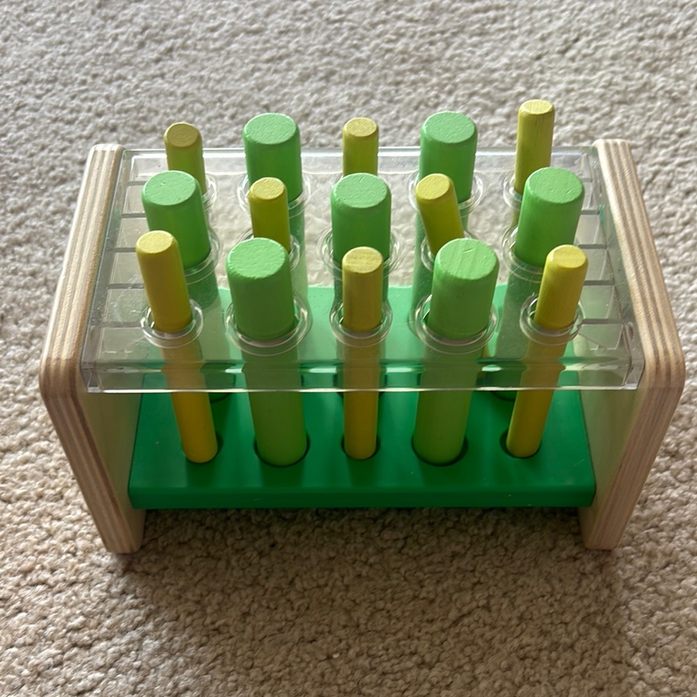 Lovevery Green and Yellow Wooden Peg Toy